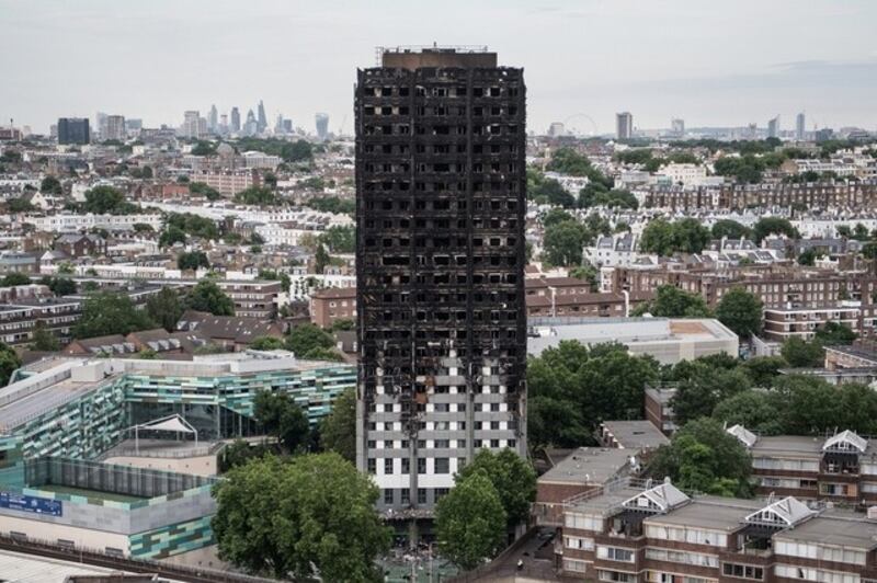 The remains of Grenfell Tower as seen from a neighbouring block in London. The tragedy, which claimed tens of lives, has delivered profound effects on British society. Carl Court / Getty Images