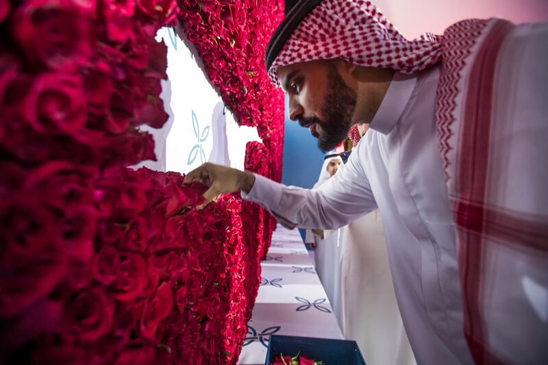 Visitors helped fill in flowers to break the Guinness World Records.