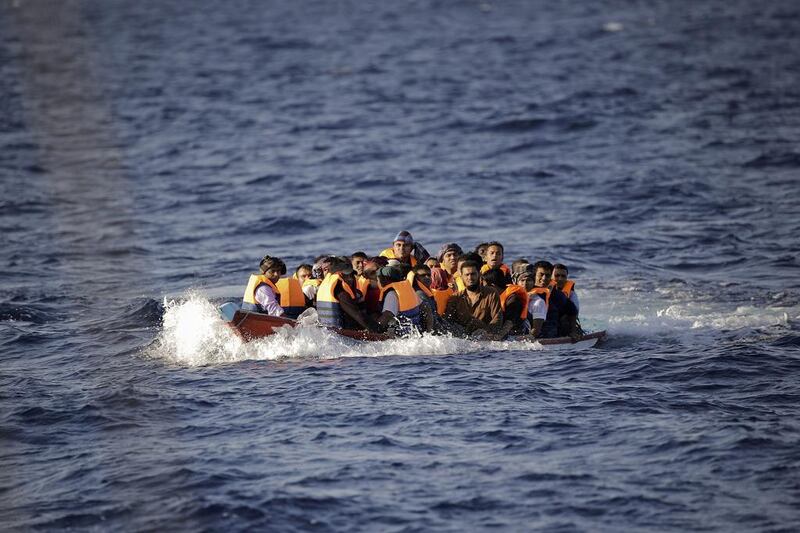 Migrants and refugees fleeing Libyaare rescued by members of a Spanish NGO in Mediterranean Sea, about 25 miles north of Sabratha, Libya. Emilio Morenatti / AP Photo