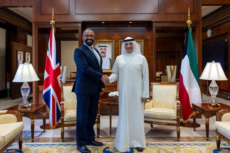 Britain's Foreign Secretary James Cleverly shakes hands with Kuwait's Fpreign Minister Sheikh Salem Al Sabah in Kuwait City. KUNA / Reuters