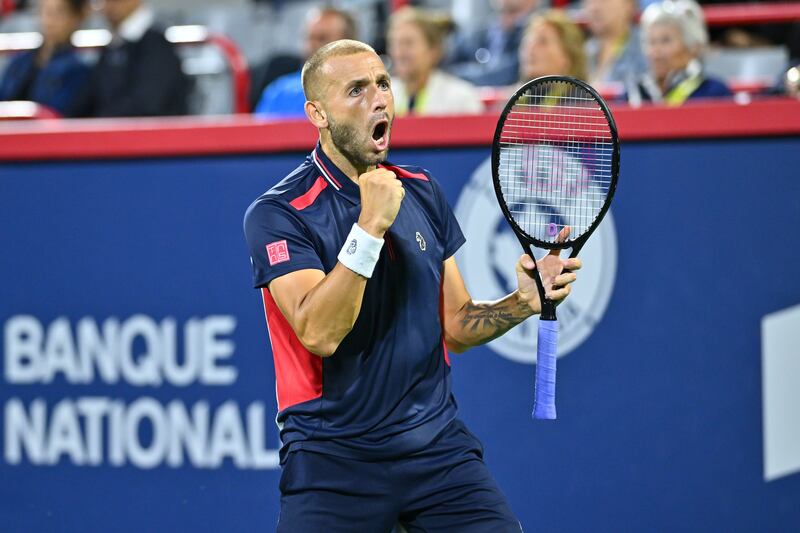 Daniel Evans of Great Britain reacts after winning a point against Tommy Paul of the United States. AFP