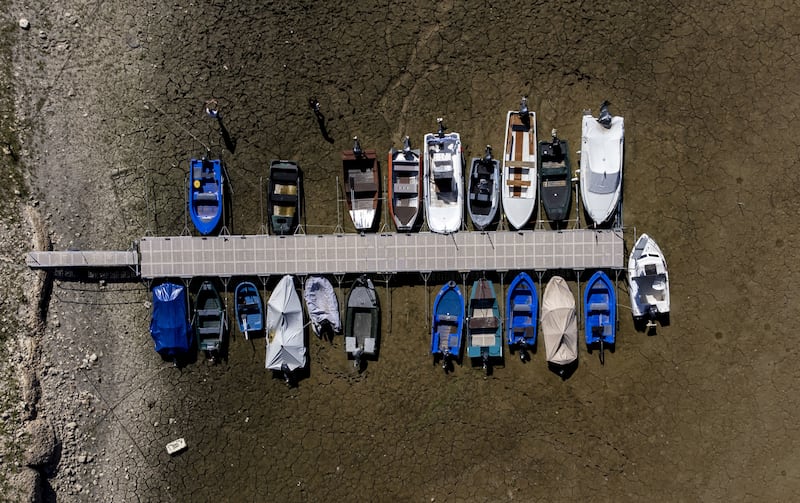 Boats on the dried bed of the drought-affected Doubs river on the border with France in Les Brenets, Switzerland. Reuters