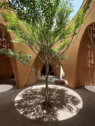 Mud-covered, cave-like structures link the cones so visitors keep cool without air conditioning on most of the site. Courtesy Austria Expo 2020 Dubai