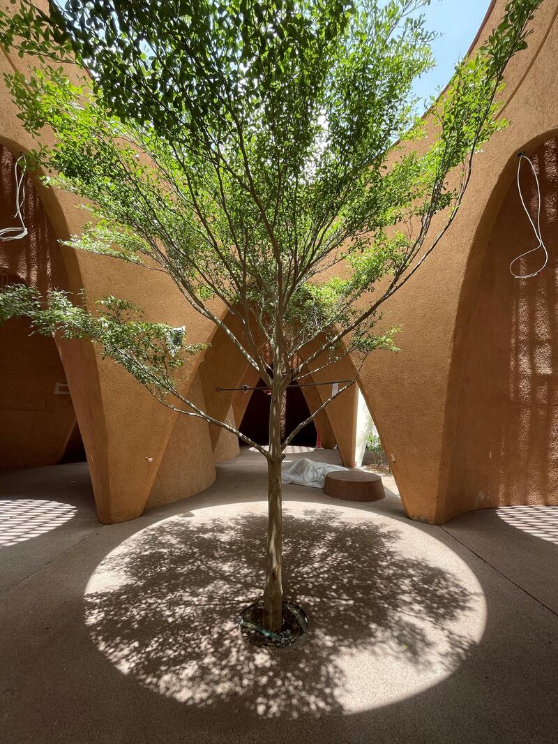 Mud-coloured cave-like domes interlink the cones so visitors can walk across most of the structure that promises to stay pleasant without air-conditioning through the six-month Expo.