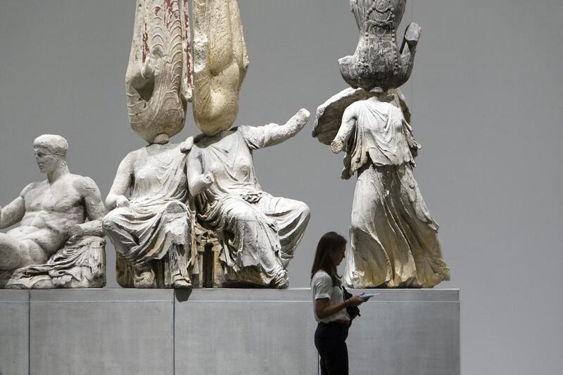 A visitor walks past the artwork Eternity by Xu Zhen in the Unlimited section. Harold Cunningham / Getty Images