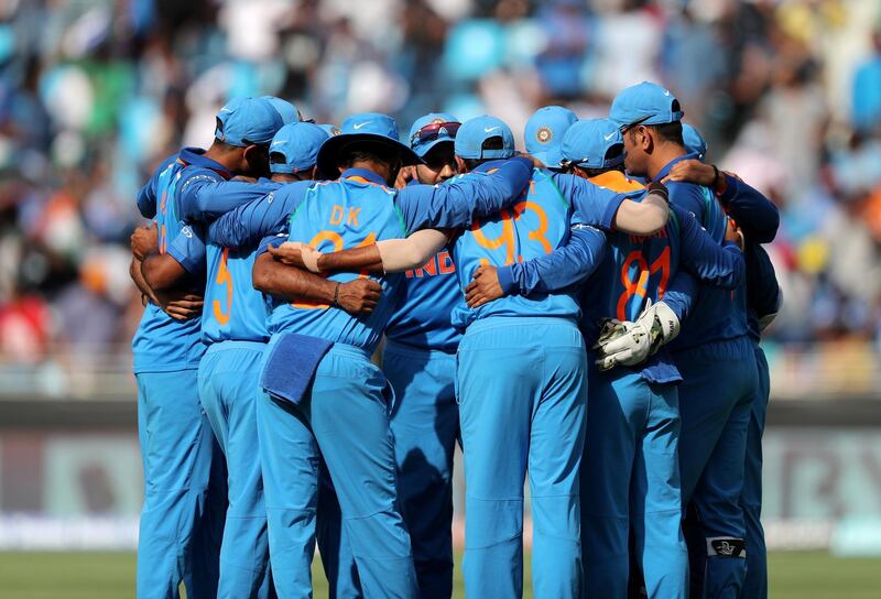 Dubai, United Arab Emirates - September 23, 2018: India in a huddle during the game between India and Pakistan in the Asia cup. Sunday, September 23rd, 2018 at Sports City, Dubai. Chris Whiteoak / The National