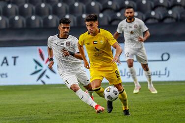 Al Wasl midfielder Nicolas Oroz is challenge by Al Jazira’s Abdulla Ramadan in the Arabian Gulf League clash at Mohamed bin Zayed Stadium. Courtesy PLC