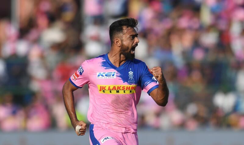 Rajasthan Royals bowler Jaydev Unadkat celebrates after dismissing Mumbai Indians batsman Kieron Pollard during the 2019 Indian Premier League (IPL) Twenty20 cricket match between Rajasthan Royals and Mumbai Indians at the Sawai Mansingh Stadium in Jaipur on April 20, 2019. (Photo by Money SHARMA / AFP) / ----IMAGE RESTRICTED TO EDITORIAL USE - STRICTLY NO COMMERCIAL USE-----