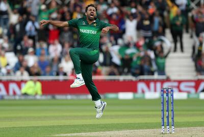 Pakistan's Wahab Riaz celebrates taking the wicket of England's Chris Woakes,  during the Cricket World Cup match between England and Pakistan at Trent Bridge in Nottingham, Monday, June 3, 2019. (David Davies/PA via AP)