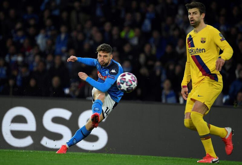 Napoli's Belgian forward Dries Mertens shoots during the Champions League round of 16 first-leg against Barcelona at the San Paolo Stadium in Naples. AFP