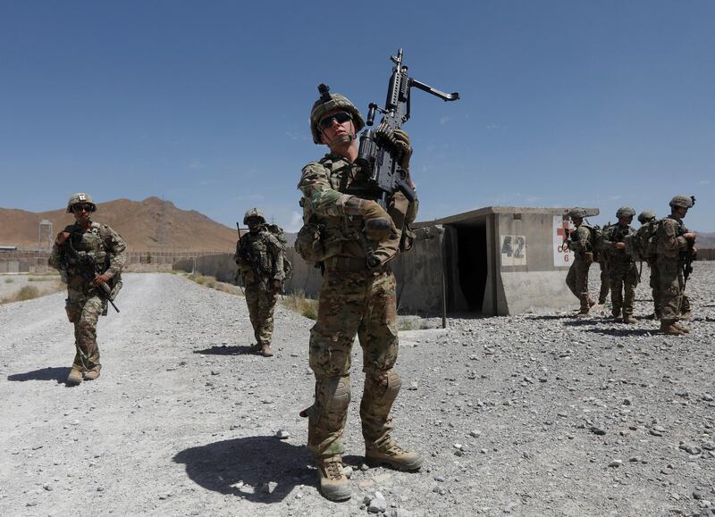 FILE PHOTO: U.S. troops patrol at an Afghan National Army (ANA) base in Logar province, Afghanistan August 7, 2018. REUTERS/Omar Sobhani/File Photo