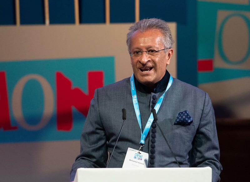 Mohamed Amersi addresses the One Young World Summit at the Methodist Hall in London in October 2019. Facundo Arrizabalaga / EPA-EFE / Shutterstock