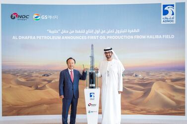 South Korean deputy trade, industry and energy minister Il-pyo Hong, left with Dr Al Jaber. Courtesy Adnoc