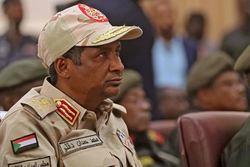 Sudan's paramilitary commander Mohamed Hamdan Dagalo attends a ceremony in Khartoum aimed at ending a deep crisis caused by last year's military coup. AFP