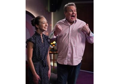 This image released by ABC shows Aubrey Anderson-Emmons, left, and Eric Stonestreet in a scene from "Modern Family."  The popular comedy series ends its 11-season run with a two-hour finale on Wednesday. (Eric McCandless/ABC via AP)