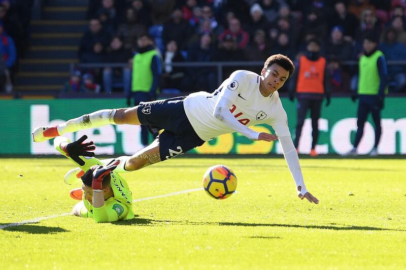 LONDON, ENGLAND - FEBRUARY 25:  Dele Alli of Tottenham Hotspur is challenged by Wayne Hennessey of Crystal Palace during the Premier League match between Crystal Palace and Tottenham Hotspur at Selhurst Park on February 25, 2018 in London, England.  (Photo by Mike Hewitt/Getty Images)