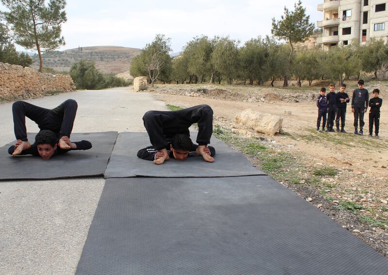 Boys take part in an open-air training session with Syrian martial arts coach Hassan Mansour.