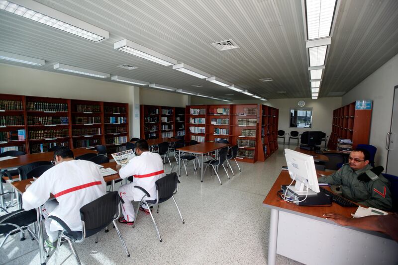 Dubai , United Arab Emirates- February, 16, 2011 ;  Inmates  at the Library section  at the General Department of  Correctional Institutions in Dubai.   ( Satish Kumar / The National ) 