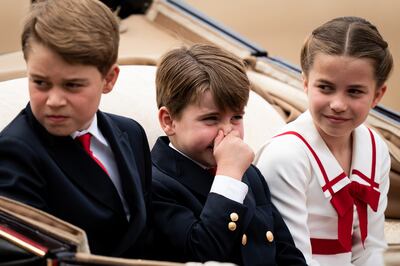 (Left-right) Prince George, Prince Louis and Princess Charlotte during the Trooping the Colour ceremony at Horse Guards Parade. PA