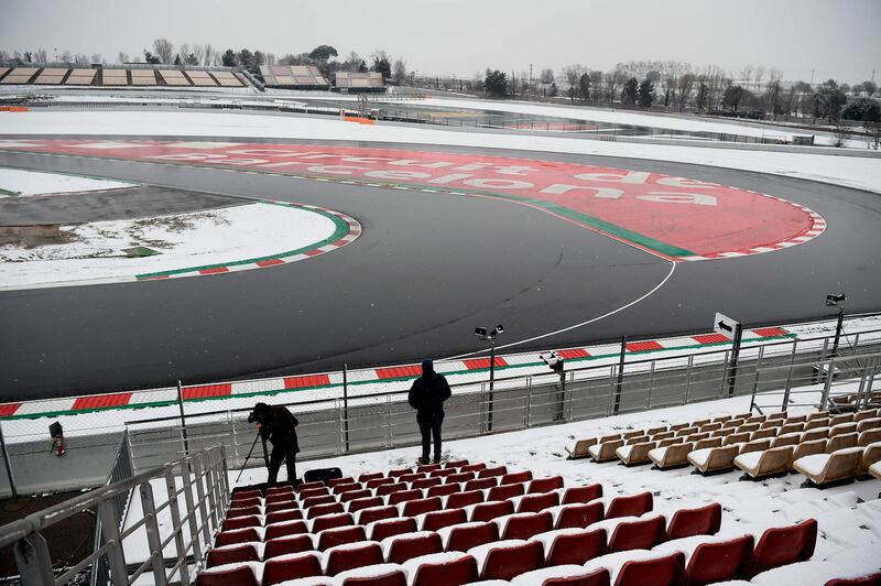 Snow covers the track during a snowfall at the Circuit de Catalunya. Josep Lago / AFP
