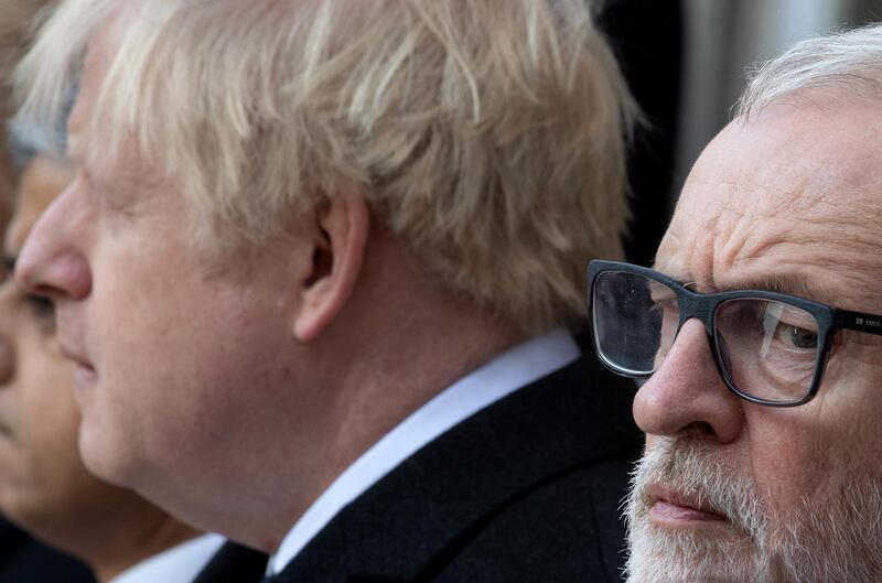 LONDON, ENGLAND - DECEMBER 02: (L-R) Prime Minister, Boris Johnson and Labour Leader, Jeremy Corbyn attend a vigil for victims Jack Merritt, 25, and Saskia Jones, 23 of the London Bridge attack and to honour the public and emergency services who responded to the incident at the Guildhall Yard on December 2, 2019 in London England.  Usman Khan, a 28 year old former prisoner convicted of terrorism offences, killed two people in Fishmongers' Hall at the North end of London Bridge on Friday, November 29, before continuing his attack on the bridge. Mr Khan was restrained and disarmed by members of the public before being shot by armed police.  (Photo by Leon Neal/Getty Images)