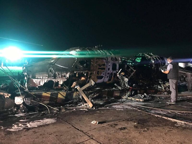 Debris of the crashed plane are seen at Pasay City, Metro Manila. REUTERS