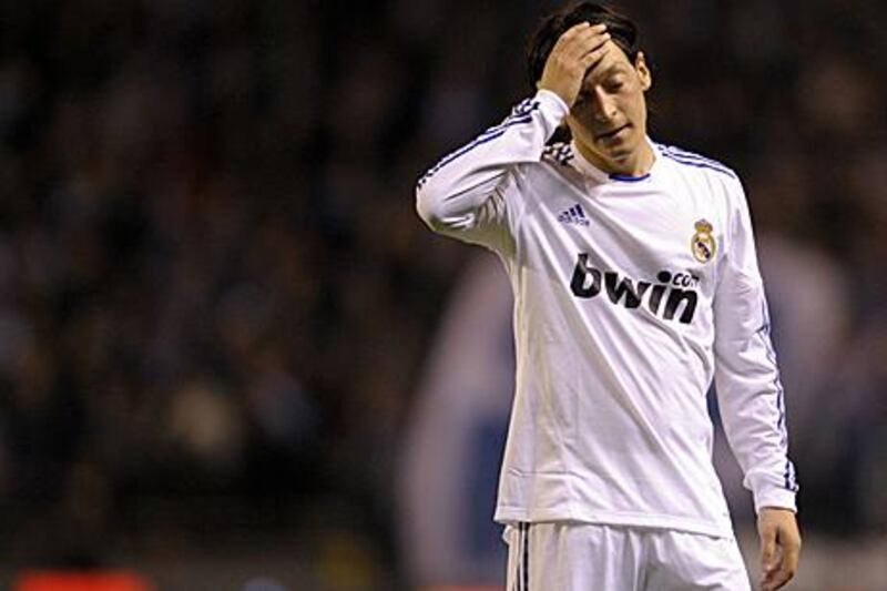 Mesut Ozil reacts after Real Madrid are held to a 0-0 draw at Deportivo La Coruna.