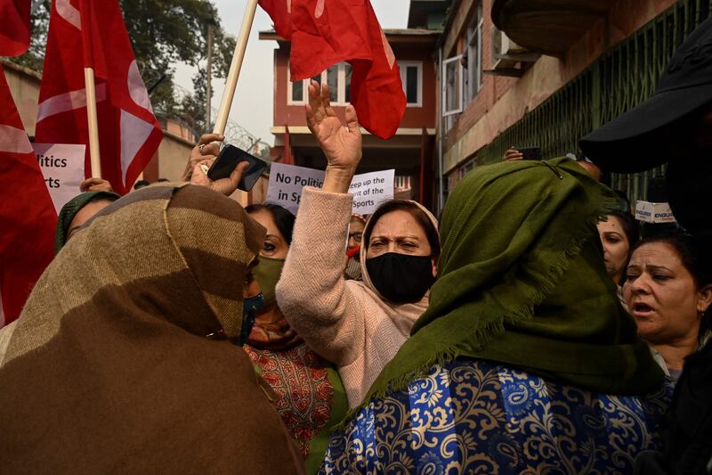 Women protest in Srinagar, the main city in India-administered Kashmir, on November 1, 2021, against charges filed against students who allegedly celebrated a win over India by Pakistan's cricket team. AFP