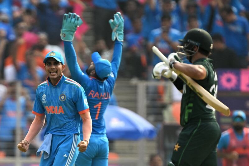 India's Shubman Gill celebrates after the dismissal of Pakistan's Imam-ul-Haq, right. AFP