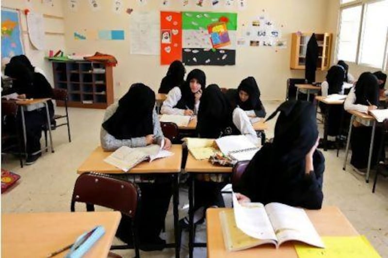 10th grade students at the Al Taleaa Secondary School attend Islamic Studies class.