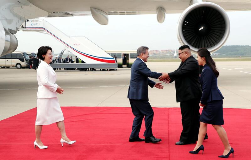 South Korean President Moon Jae-in is greeted by North Korean leader Kim Jong-un. Reuters