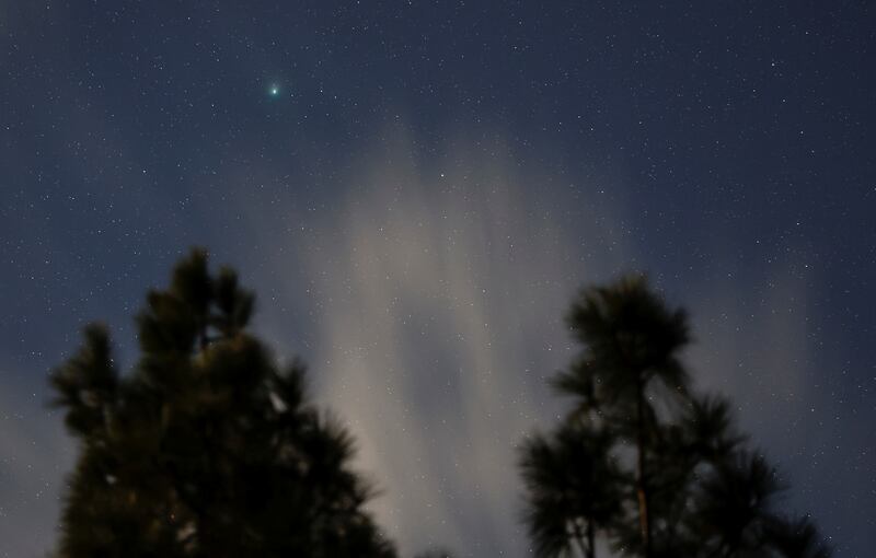 A green comet named Comet C/2022 E3 (ZTF), which last passed by Earth about 50,000 years ago, is seen from Spain's island of Gran Canaria