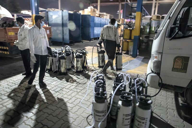 SHARJAH, UNITED ARAB EMIRATES. 26 MARCH 2020. Sharjah Municipal staff prepare spray canisters at the main Enviroment Services Department of the Sharjah Municipality to disinfect the streets of Sharjah after the mandatory 8pm curfew. (Photo: Antonie Robertson/The National) Journalist: None. Section: National.