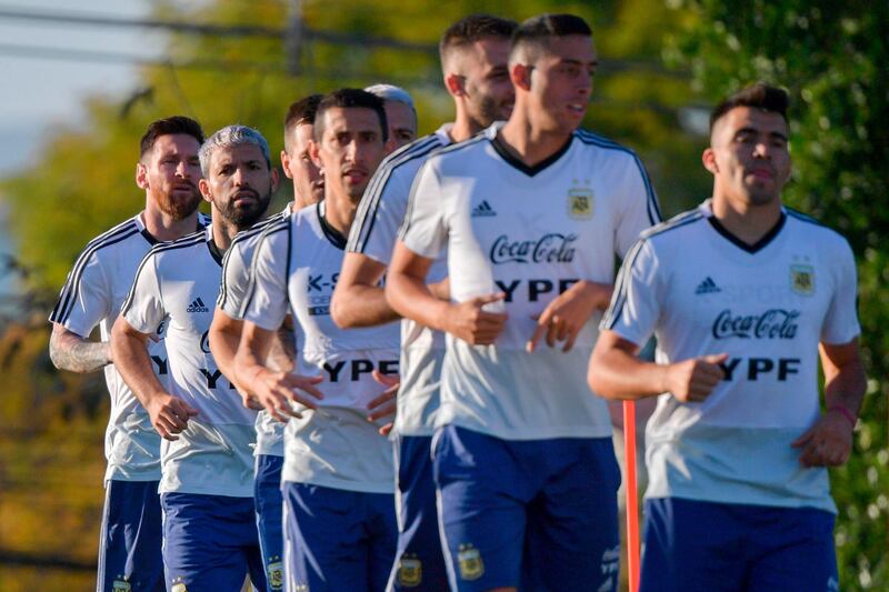 Argentina players jog during training. AFP