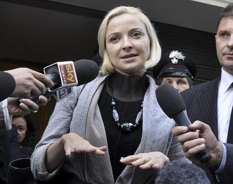 Domnica Cemortan, from Moldova, leaves court after testifying in a hearing in the trial of Captain Francesco Schettino, in Grosseto, Italy. The Moldovan dancer, who was on the bridge when the Costa Concordia crashed into the reef, has testified she was the lover of Captain Schettino. Giacomo Aprili / AP Photo