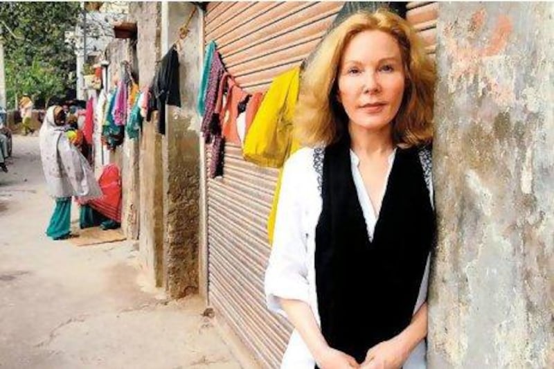 Katherine Boo in Mumbai’s Annawadi slum. Her book Behind the Beautiful Forevers: Life, Death and Hope in a Mumbai Undercity is centred on the slum, which was the setting of the film Slumdog Millionaire. Courtesy Tribhuvan Tiwari / Outlook