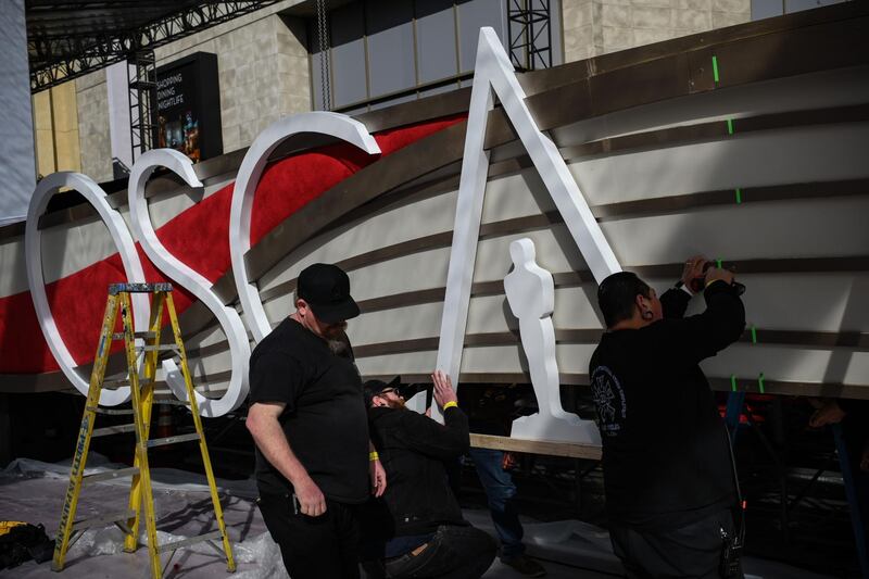 "OSCARS" letters are installed on the red carpet. AFP