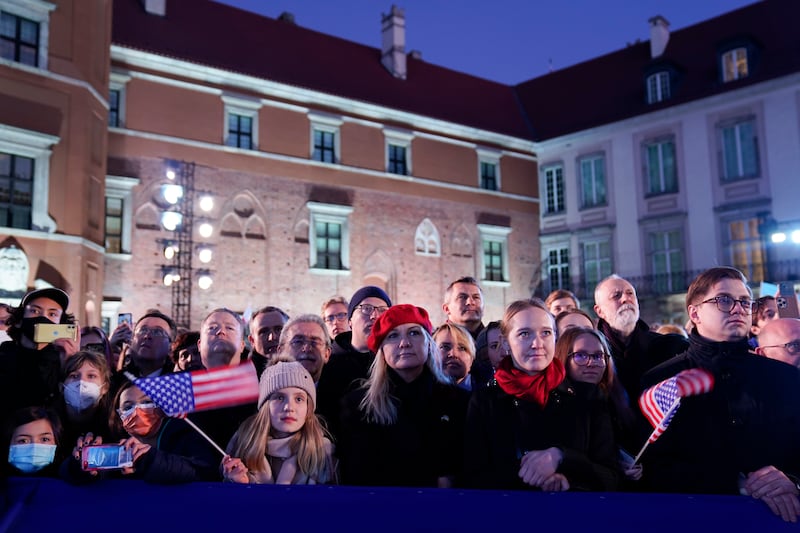 People listen as the US president delivers his speech about the Russian invasion of Ukraine.  AP