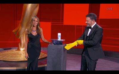 This handout screen shot released courtesy of American Broadcasting Companies, Inc. / ABC shows host Jimmy Kimmel and actress Jennifer Aniston disinfecting ballots during the 72nd Primetime Emmy Awards ceremony held virtually on September 20, 2020. Hollywood's first major Covid-era award show will look radically different to previous editions, with no red carpet and a host broadcasting from an empty theater in Los Angeles, which remains under strict lockdown. - RESTRICTED TO EDITORIAL USE - MANDATORY CREDIT "AFP PHOTO / American Broadcasting Companies, Inc. / ABC" - NO MARKETING NO ADVERTISING CAMPAIGNS - DISTRIBUTED AS A SERVICE TO CLIENTS --- NO ARCHIVE ---

 / AFP / American Broadcasting Companies, Inc. / ABC / RESTRICTED TO EDITORIAL USE - MANDATORY CREDIT "AFP PHOTO / American Broadcasting Companies, Inc. / ABC" - NO MARKETING NO ADVERTISING CAMPAIGNS - DISTRIBUTED AS A SERVICE TO CLIENTS --- NO ARCHIVE ---

