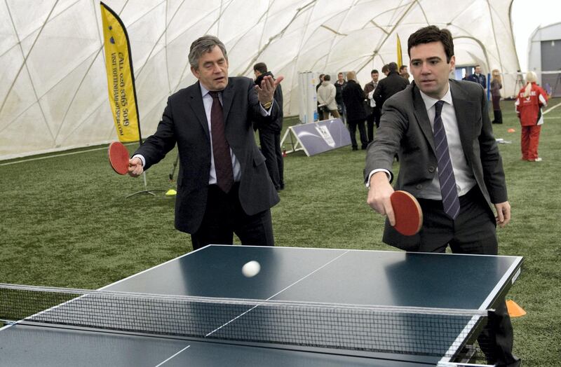 CHIGWELL, UNITED KINGDOM - JANUARY 16:  Prime Minister Gordon Brown plays with Sports minister Andy Burnham during a visit to Tottenham Hotspur's training ground on January 16, 2009 in Chigwell, London. (Photo by Arthur Edwards/WPA Pool/Getty Images)