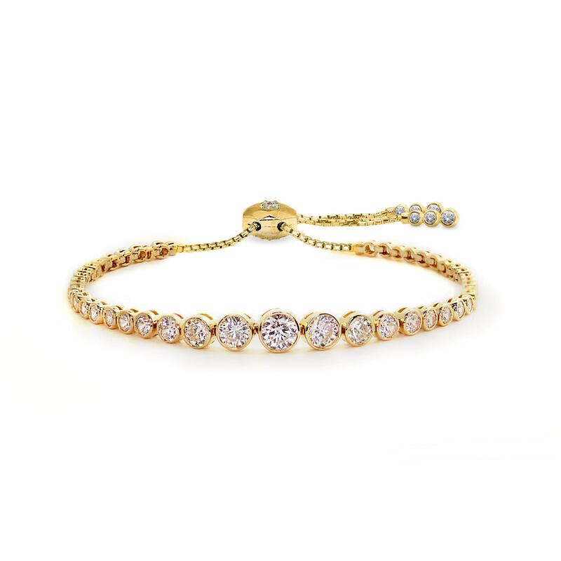 Quentin bracelet in yellow gold with&nbsp;round brilliant-cut stones in a bezel setting from Carat London; Dh950