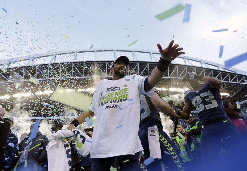 Seattle quarterback Russell Wilson celebrates after Seahawks' victory in the NFL NFC Championship final against the Green Bay Packers Sunday, Jan. 18, 2015, in Seattle. David J. Phillip/AP