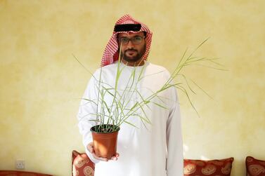 Mohamed Al Mehairbi believes grass is a vital resource for the planet's sustainability. Pawan Singh / The National