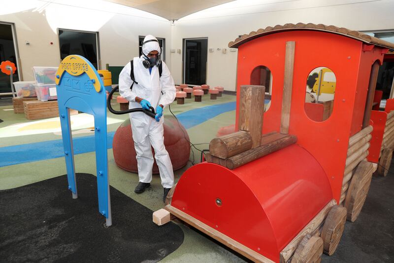 Professional cleaners at work in the Swiss International Scientific School in Dubai.