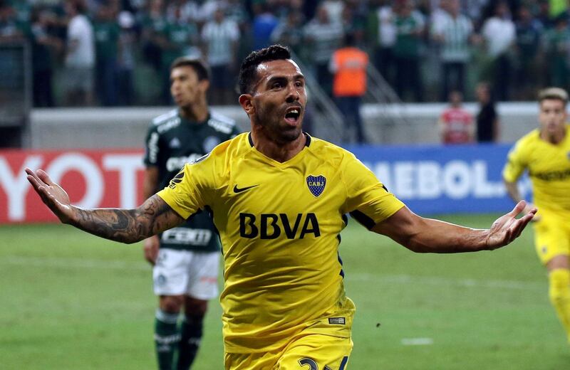 FILE PHOTO: Soccer Football - Palmeiras v Boca Juniors - Copa Libertadores - Allianz Parque Stadium, Sao Paulo, Brazil - April 11, 2018.  Carlos Tevez of Argentina's Boca Juniors celebrates after scoring a goal. REUTERS/Paulo Whitaker/File Photo