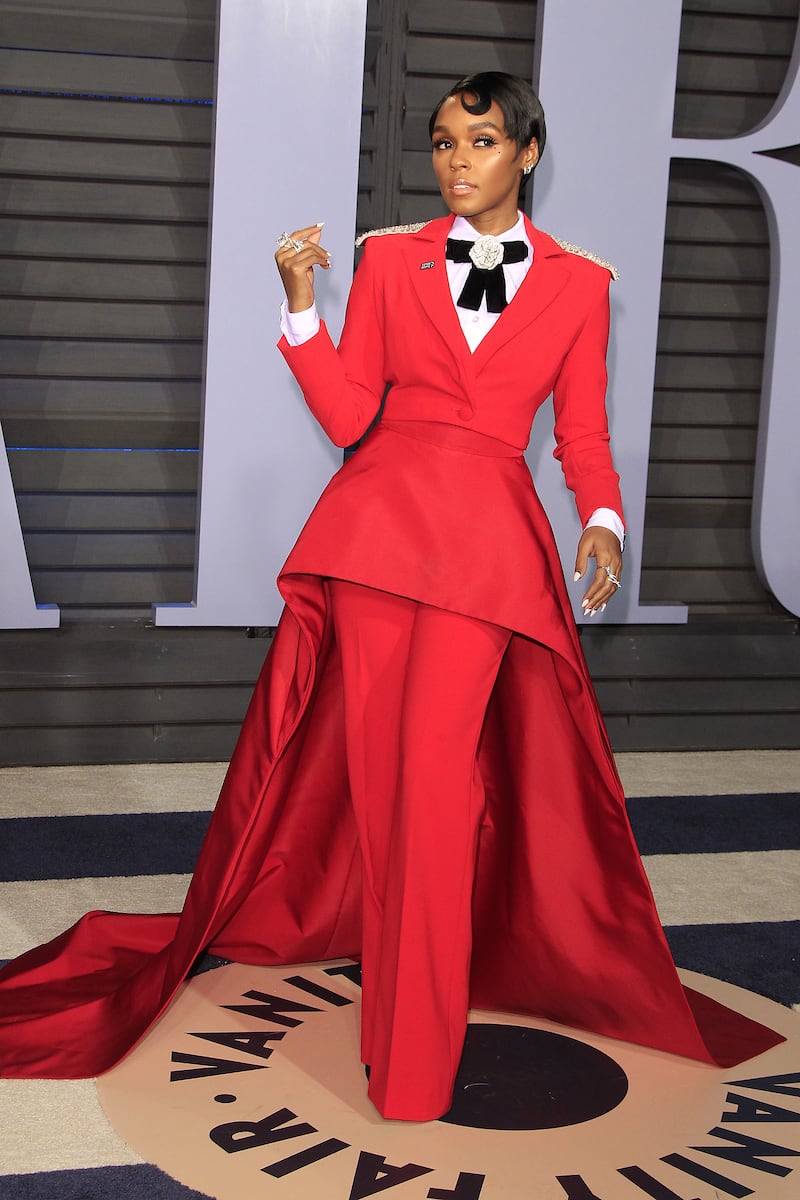 Janelle Monae, wearing red Christian Siriano, arrives at the 2018 Vanity Fair Oscars Party on March 4, 2018. EPA