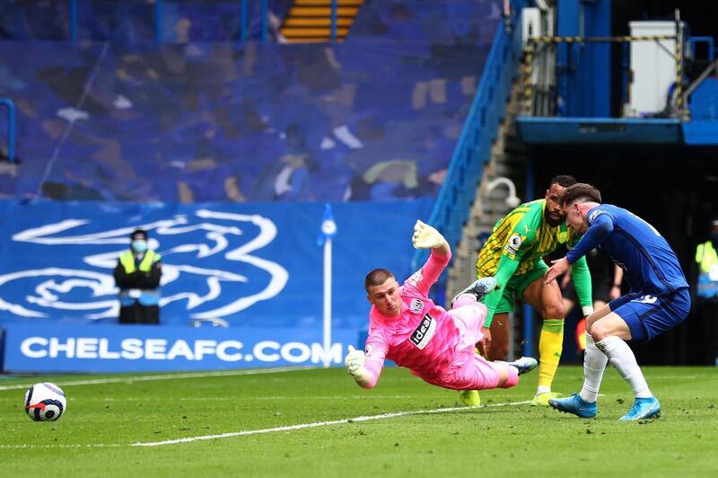 Chelsea's midfielder Mason Mount scores his team's second goal past West Bromwich Albion's goalkeeper Sam Johnston. AFP