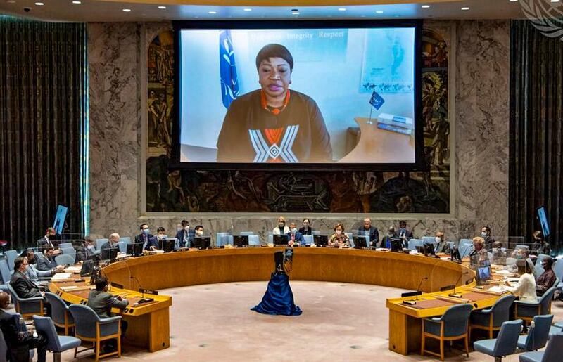 In this photo provided by the United Nations, International Criminal Court prosecutor Fatou Bensouda is shown on screen as she makes a virtual final address to the United Nations Security Council, Wednesday, June 9, 2021, at U.N. headquarters. (Eskinder Debebe/United Nations via AP)