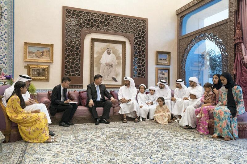ABU DHABI, UNITED ARAB EMIRATES - July 20, 2018: HH Sheikh Mohamed bin Zayed Al Nahyan Crown Prince of Abu Dhabi Deputy Supreme Commander of the UAE Armed Forces (5th L), held a private dinner for HE Xi Jinping, President of China (4th L), at Sea Palace. Seen with HH Major General Sheikh Khaled bin Mohamed bin Zayed Al Nahyan, Deputy National Security Adviser (2nd L), HH Sheikha Salama bint Mohamed bin Hamad bin Tahnoon Al Nahyan (L), HH Sheikh Saif bin Nahyan bin Saif Al Nahyan (6th L), HH Sheikh Mohamed bin Nahyan bin Saif Al Nahyan (7th L), HH Sheikh Theyab bin Mohamed bin Zayed Al Nahyan, Chairman of the Department of Transport, and Abu Dhabi Executive Council Member (8th L), HH Sheikh Hamdan bin Mohamed bin Zayed Al Nahyan (9th L), HH Sheikh Zayed bin Mohamed bin Hamad bin Tahnoon Al Nahyan (10th L), HH Sheikha Salama bint Diab bin Mohamed bin Zayed Al Nahyan (11th L), HH Sheikha Hassa bint Mohamed bin Hamad bin Tahnoon Al Nahyan (12th L), HH Sheikha Hassa bint Mohamed bin Zayed Al Nahyan (R) and HH Sheikha Salama bint Diab bin Mohamed bin Zayed Al Nahyan (front 7th R).

( Rashed Al Mansoori / Crown Prince Court - Abu Dhabi )
---