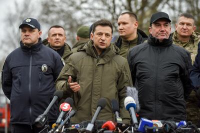 Ukrainian President Volodymyr Zelenskiy speaks to reporters in southern Ukraine on Saturday after watching training exercises for police officers and the National Guard. EPA